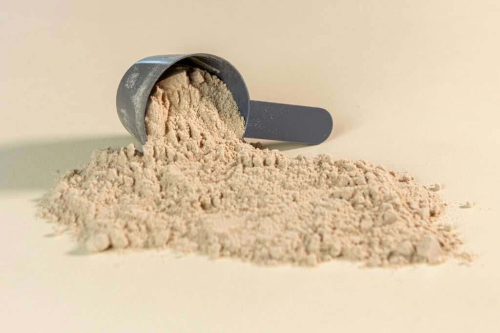 a scoop of non-toxic protein powder sitting on top of a table