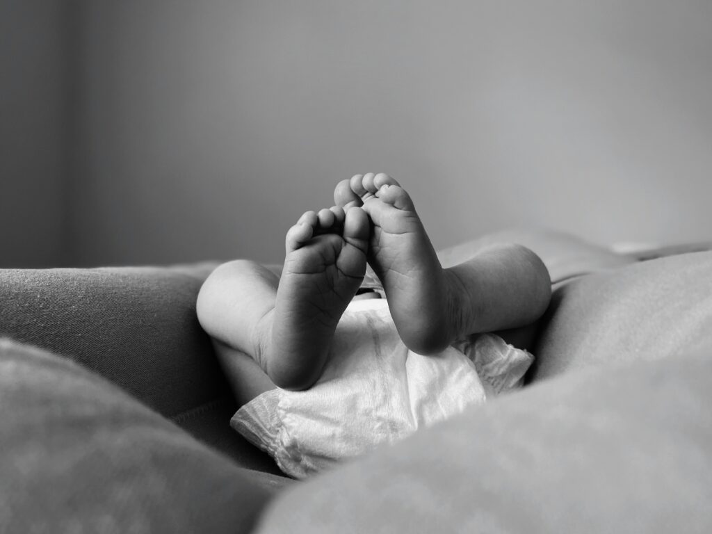 black and white diaper on baby