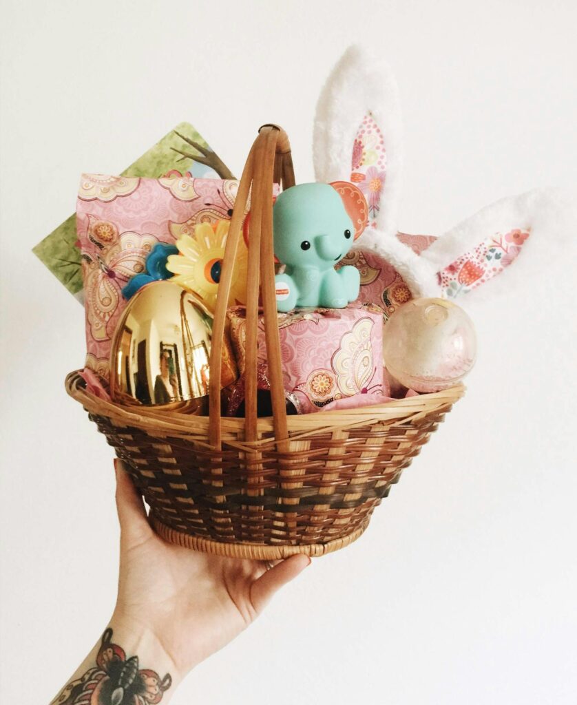 A beautifully decorated eco friendly Easter basket featuring colorful eggs and festive gifts, capturing the spirit of Easter.