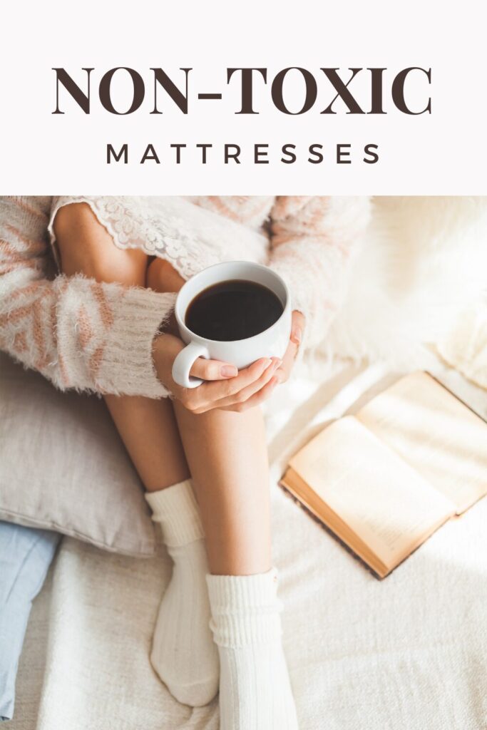 a close up image of a woman laying on a non-toxic mattress drinking coffee