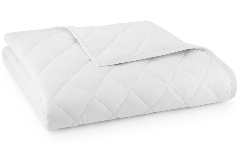 Lightweight quilted organic cotton comforter with diamond stitching, folded neatly on a white background